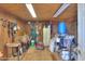 Organized tack room with various equestrian supplies at 52615 W Esch Trl, Maricopa, AZ 85139