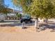 Utility vehicle parked under shaded carport at 52615 W Esch Trl, Maricopa, AZ 85139