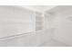 Spacious walk-in closet with double hanging rods and shelving at 6270 W Rose Garden Ln, Glendale, AZ 85308