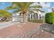 Two-story house with three-car garage and palm tree at 6270 W Rose Garden Ln, Glendale, AZ 85308