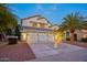 Two-story house with three-car garage, palm tree, and well-manicured landscaping at 6270 W Rose Garden Ln, Glendale, AZ 85308