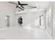 Bright living room with high ceilings and tile floors at 6270 W Rose Garden Ln, Glendale, AZ 85308