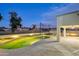 Relaxing pool area with outdoor kitchen and patio at 6270 W Rose Garden Ln, Glendale, AZ 85308