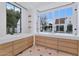 Spa-like bathroom with dual vanities and large windows at 6737 E Exeter Blvd, Scottsdale, AZ 85251