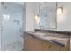 Modern bathroom with gray marble vanity and shower at 6737 E Exeter Blvd, Scottsdale, AZ 85251