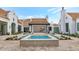 Stunning courtyard with a central water feature and open-air design at 6737 E Exeter Blvd, Scottsdale, AZ 85251