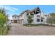 Exterior view of charming two story home with brick facade at 6737 E Exeter Blvd, Scottsdale, AZ 85251