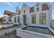 Elegant home exterior featuring a white brick facade and a charming entrance at 6737 E Exeter Blvd, Scottsdale, AZ 85251