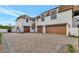 Three-car garage with wood doors at 6737 E Exeter Blvd, Scottsdale, AZ 85251