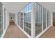 Light-filled hallway with large windows overlooking the courtyard at 6737 E Exeter Blvd, Scottsdale, AZ 85251