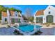 Luxury pool with fountains, surrounded by a spacious patio at 6737 E Exeter Blvd, Scottsdale, AZ 85251