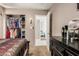 Bedroom with walk-in closet and dresser at 7210 W Pasadena Ave, Glendale, AZ 85303