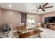 Bright dining area with wooden table and bench seating at 7210 W Pasadena Ave, Glendale, AZ 85303