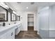 Modern bathroom with white subway tiles and a glass shower at 7480 E Sweetwater Ave, Scottsdale, AZ 85260