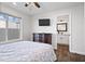 Bedroom with ensuite bathroom and built-in dresser at 7480 E Sweetwater Ave, Scottsdale, AZ 85260