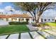 Attractive front yard with lush lawn and walkway at 7480 E Sweetwater Ave, Scottsdale, AZ 85260