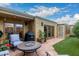 Private backyard with patio, grill, and artificial turf at 7846 E Mackenzie Dr, Scottsdale, AZ 85251