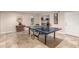 Game room features ping pong table and kitchenette at 7846 E Mackenzie Dr, Scottsdale, AZ 85251