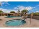 Community pool and spa with lounge chairs at 7846 E Mackenzie Dr, Scottsdale, AZ 85251