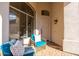 Bright entryway with seating area and view of staircase at 8134 E Rita Dr, Scottsdale, AZ 85255