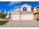 Two-story home with a two-car garage and front yard at 8134 E Rita Dr, Scottsdale, AZ 85255