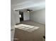 Bright bedroom with large windows and carpet at 8625 E Belleview Pl # 1047, Scottsdale, AZ 85257