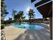 Sparkling community pool with surrounding patio at 8625 E Belleview Pl # 1047, Scottsdale, AZ 85257