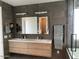 Modern bathroom with double vanity and large mirror at 9750 E Radioactive Dr, Mesa, AZ 85212