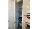 Well-organized linen closet with ample storage space at 9750 E Radioactive Dr, Mesa, AZ 85212