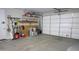 Garage with overhead storage and various tools at 9750 E Radioactive Dr, Mesa, AZ 85212