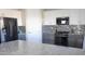 Modern kitchen with stainless steel appliances and granite counters at 9750 E Radioactive Dr, Mesa, AZ 85212