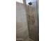 Modern shower with gray tile and a rain shower head at 9750 E Radioactive Dr, Mesa, AZ 85212