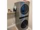 Stackable LG washer and dryer in a laundry closet at 9750 E Radioactive Dr, Mesa, AZ 85212