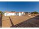 Backyard view of the house with a pergola at 9821 E University Dr, Mesa, AZ 85207