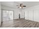 Bedroom with sliding door to patio and double closets at 9821 E University Dr, Mesa, AZ 85207