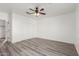 Light and airy bedroom with double sliding doors to closet at 9821 E University Dr, Mesa, AZ 85207