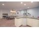 Finished basement with game tables, exercise equipment and a wet bar at 9825 E Sharon Dr, Scottsdale, AZ 85260