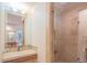 Bathroom with shower, vanity, and mirror at 9825 E Sharon Dr, Scottsdale, AZ 85260