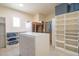 Spacious closet with ample shelving and drawers at 9825 E Sharon Dr, Scottsdale, AZ 85260