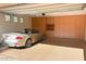 Garage with ample storage and epoxy flooring at 9825 E Sharon Dr, Scottsdale, AZ 85260