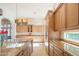 Large kitchen with island and high-end finishes at 9825 E Sharon Dr, Scottsdale, AZ 85260