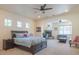 Main bedroom with fireplace and sitting area at 9825 E Sharon Dr, Scottsdale, AZ 85260