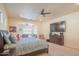 Spacious main bedroom with large TV and ample closet space at 9825 E Sharon Dr, Scottsdale, AZ 85260