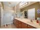 Double vanity bathroom with a walk-in shower and plenty of storage at 9945 E Prospector Dr, Gold Canyon, AZ 85118