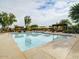 Relaxing community pool with lounge chairs and umbrellas at 9945 E Prospector Dr, Gold Canyon, AZ 85118