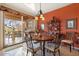 Dining area with a wooden table and access to the patio at 9945 E Prospector Dr, Gold Canyon, AZ 85118