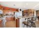 Kitchen with granite countertops and wood cabinets at 9945 E Prospector Dr, Gold Canyon, AZ 85118