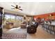 Spacious living room with a view of the backyard from large windows at 9945 E Prospector Dr, Gold Canyon, AZ 85118