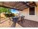 Patio with table and chairs, ideal for dining al fresco at 10614 E Twister Ave, Mesa, AZ 85212