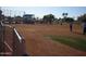 Baseball infield with players and spectators at 10731 W Mission Ln, Sun City, AZ 85351